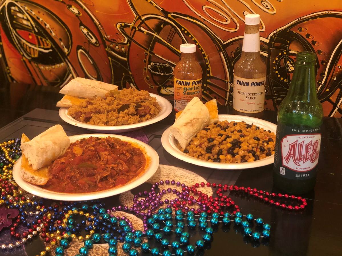 Assorted cajun and creole entrees with beads